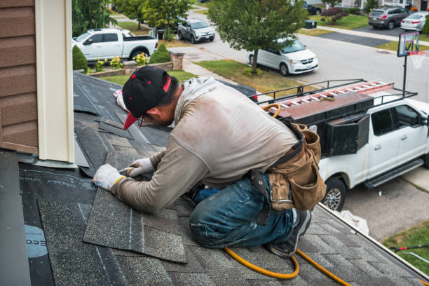 Professional Gutter Installation technician working in Hines, OR